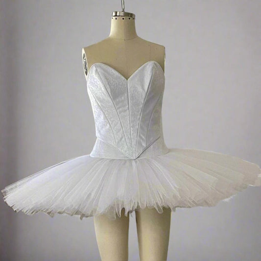 White classical ballet tutu with matching white brocade bodice.