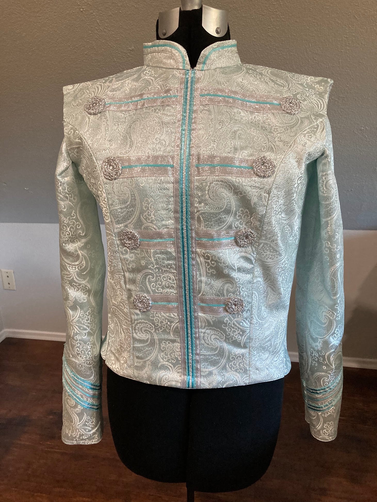 Turquoise and silver nutcracker soldier jacket.